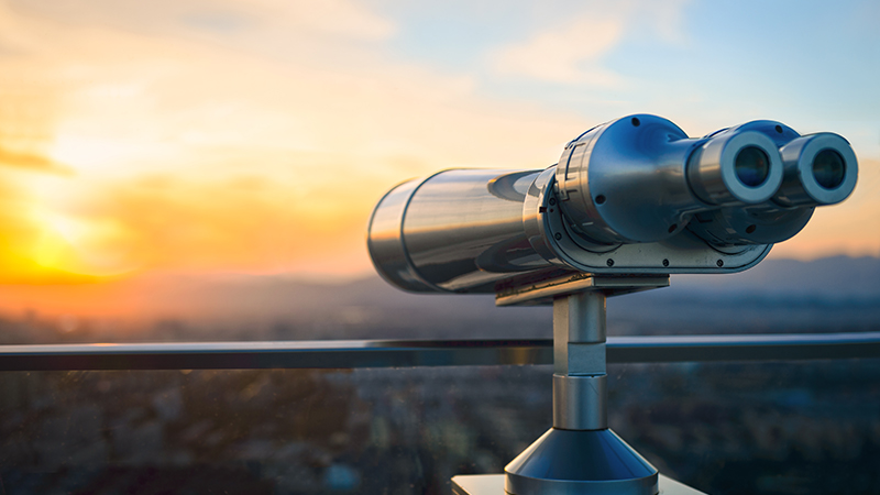 City Viewing Binoculars on Top of Building